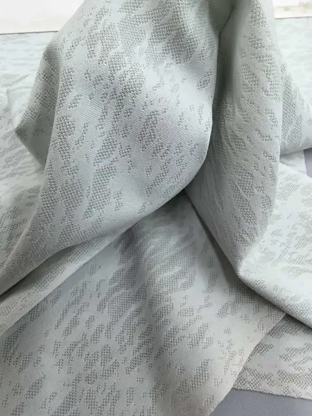 WKA90648 polyester-ammonia knitted close-knit jacquard fabric is suitable for casual sportswear women's blouses WKA90648 polyester-ammonia knitted close-knit jacquard fabric is suitable for casual sportswear women's blouses